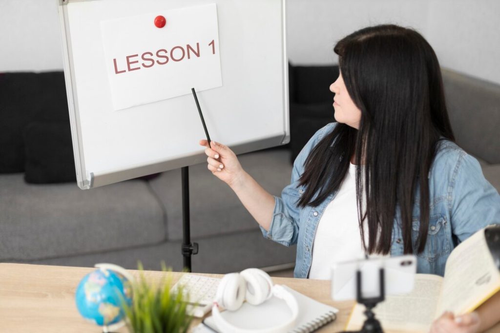 medium-shot-woman-presenting-lesson_23-2148888877